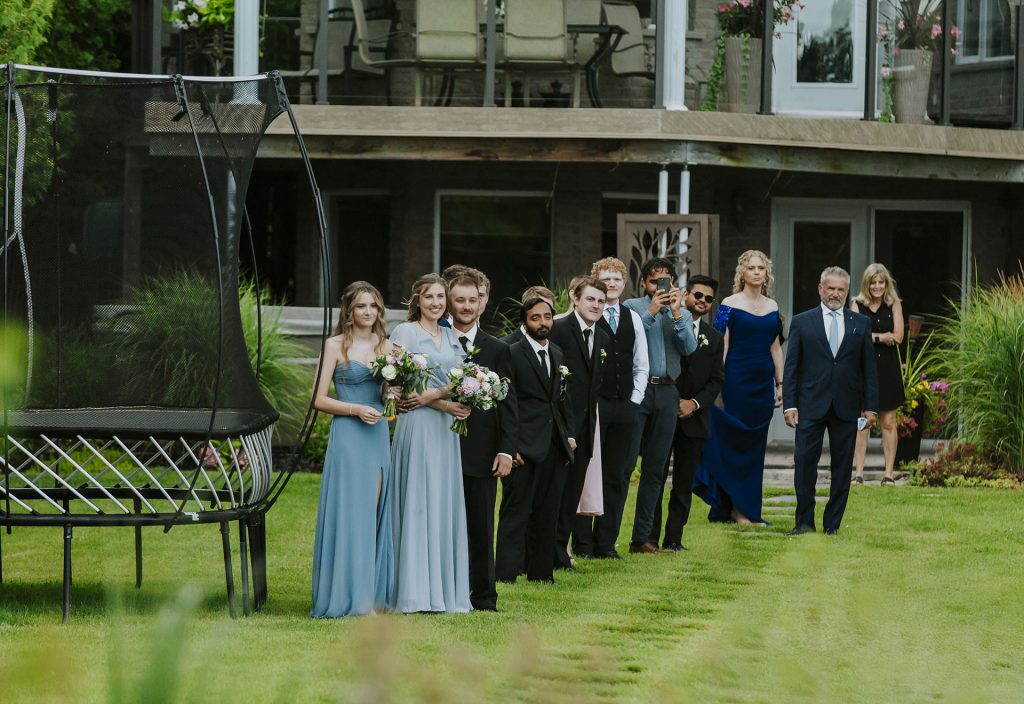 Friends and family admiring the couple during an intimate wedding in Sudbury, Ontario captured by a Sudbury Ontario wedding photographer