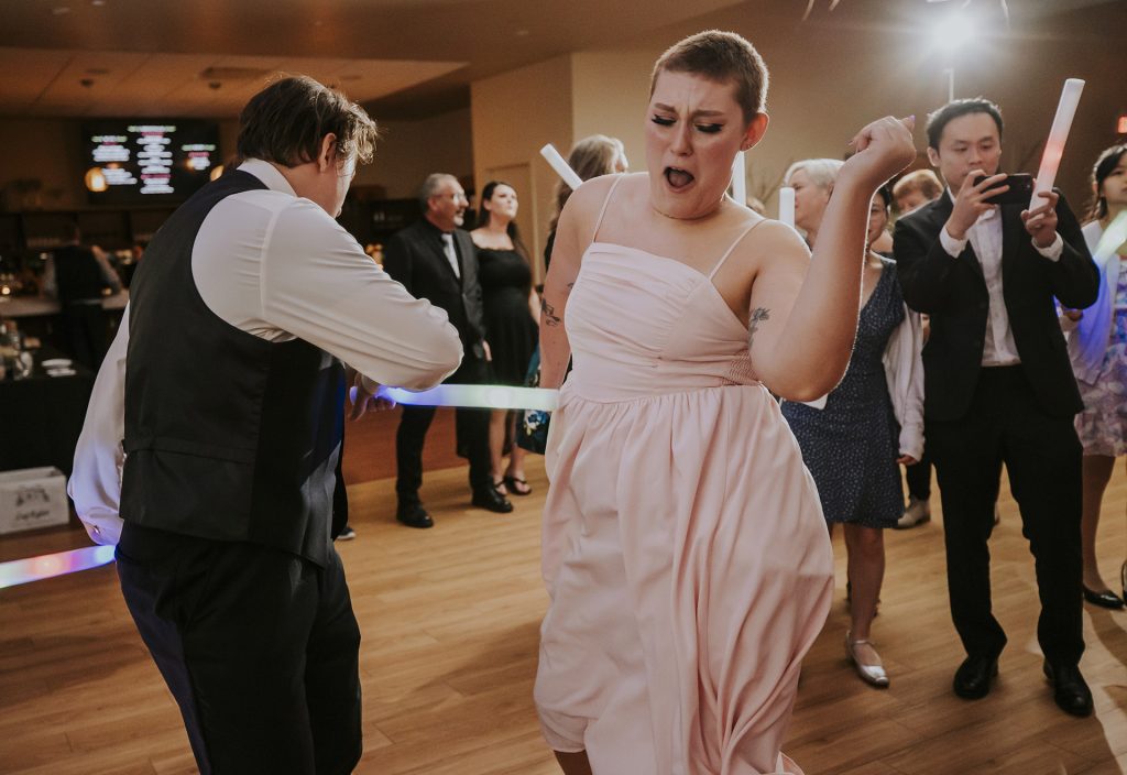 Scenes of the dance floor during an intimate wedding in Sudbury, Ontario captured by a Sudbury Ontario wedding photographer