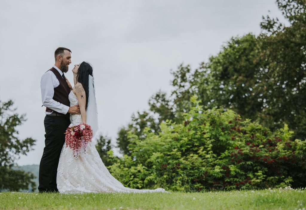 Wedding portrait of the couple looking at each other in Sudbury, Ontario