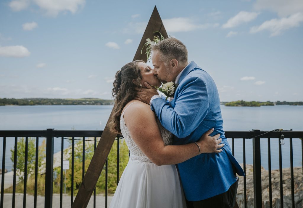 Bride and groom kissing after getting married in Sudbury, Ontario