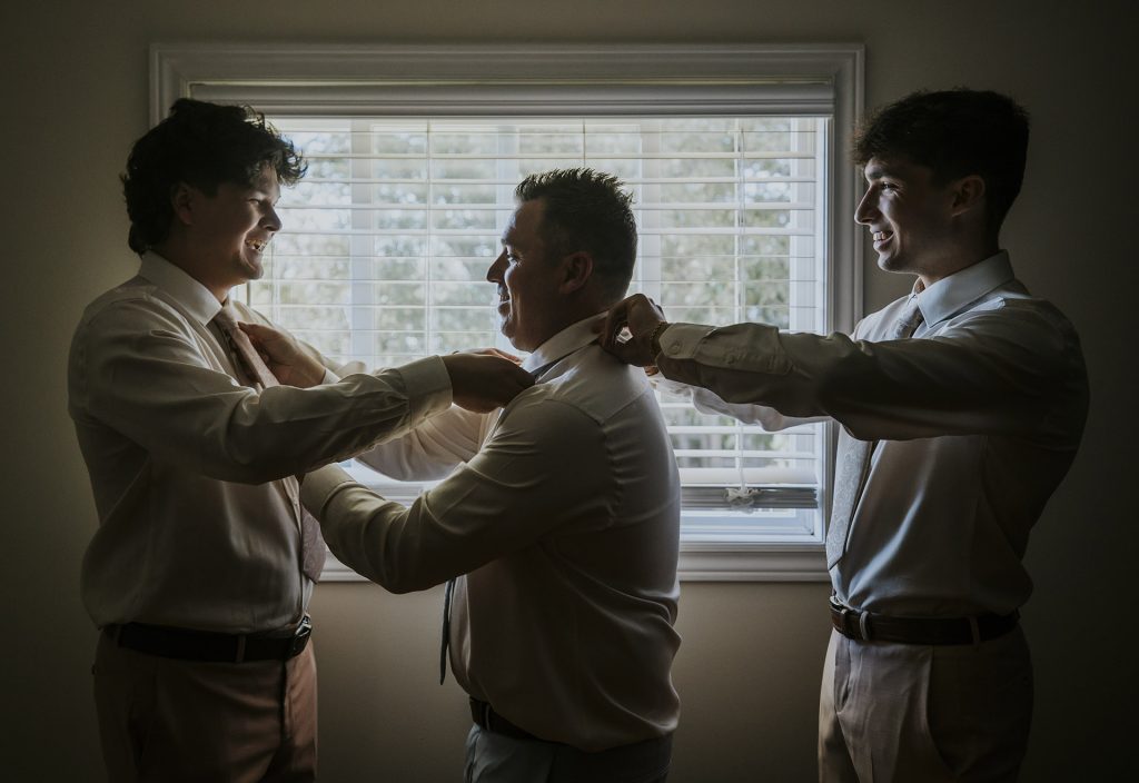 Groom getting ready with his two sons on his wedding day in Sudbury, Ontario